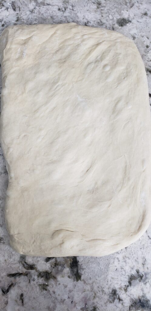Lay the dough down flat. 